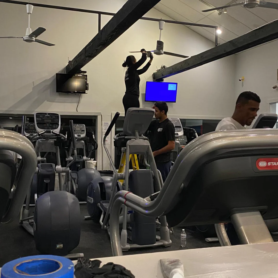 Sentinel crew high dusting in a fitness area of a Cape Cod facility