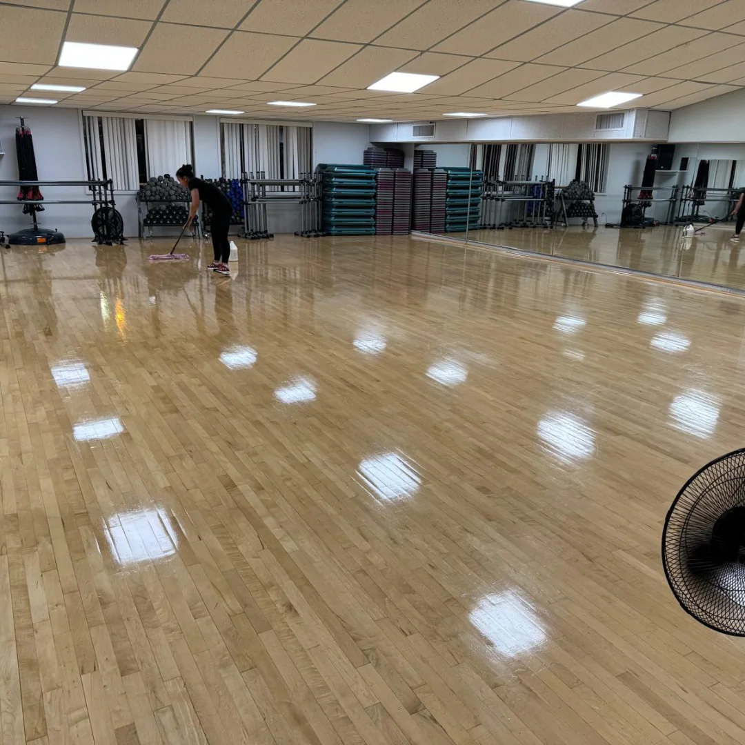 High gloss hardwood athletic floor maintained by Sentinel Cleaning Company at a Cape Cod facility