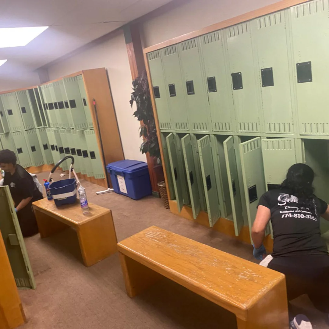 Sentinel janitorial crew cleaning a locker room at a Cape Cod athletic facility